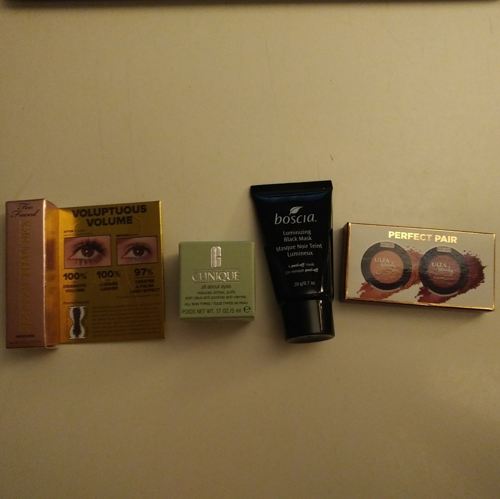 Four piece cosmetic bundle.  Mascara, eye cream, face masque, eye shadow duo.